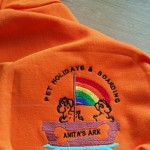 Embroidered zipped hoodie with company logo